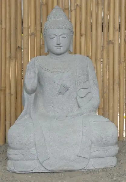 Product image of the product “Seated Buddha with floral carving - Abhaya position. About 68cm length, 42cm width, 100cm height. Natural stone (river stone), stonemasonry ”